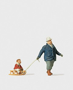 Preiser 28078 HO Scale Man Towing Sledge with Child Figure