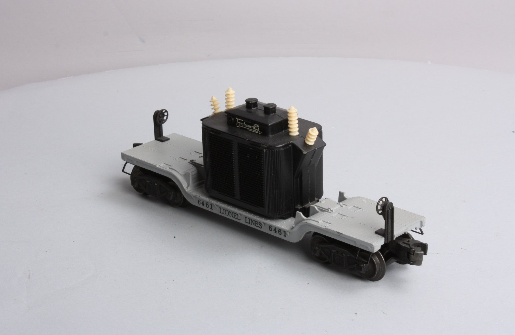 Lionel 6461 VIntage O Flatcar with Black Transformer