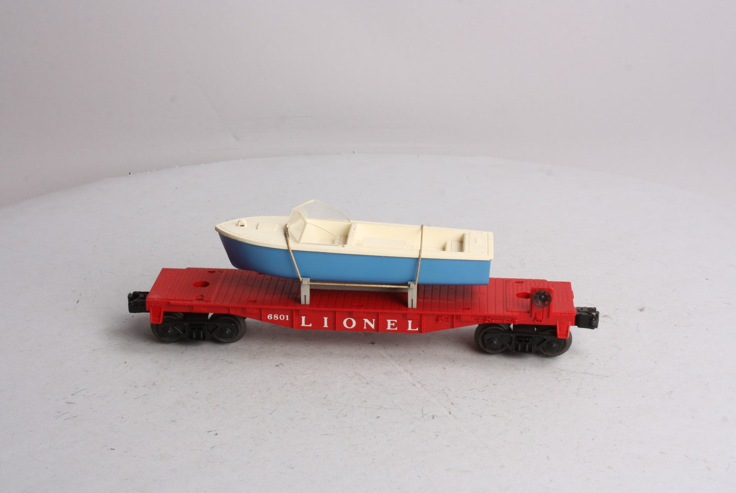 Lionel 6801-75 Vintage O Flatcar with Blue & White Boat