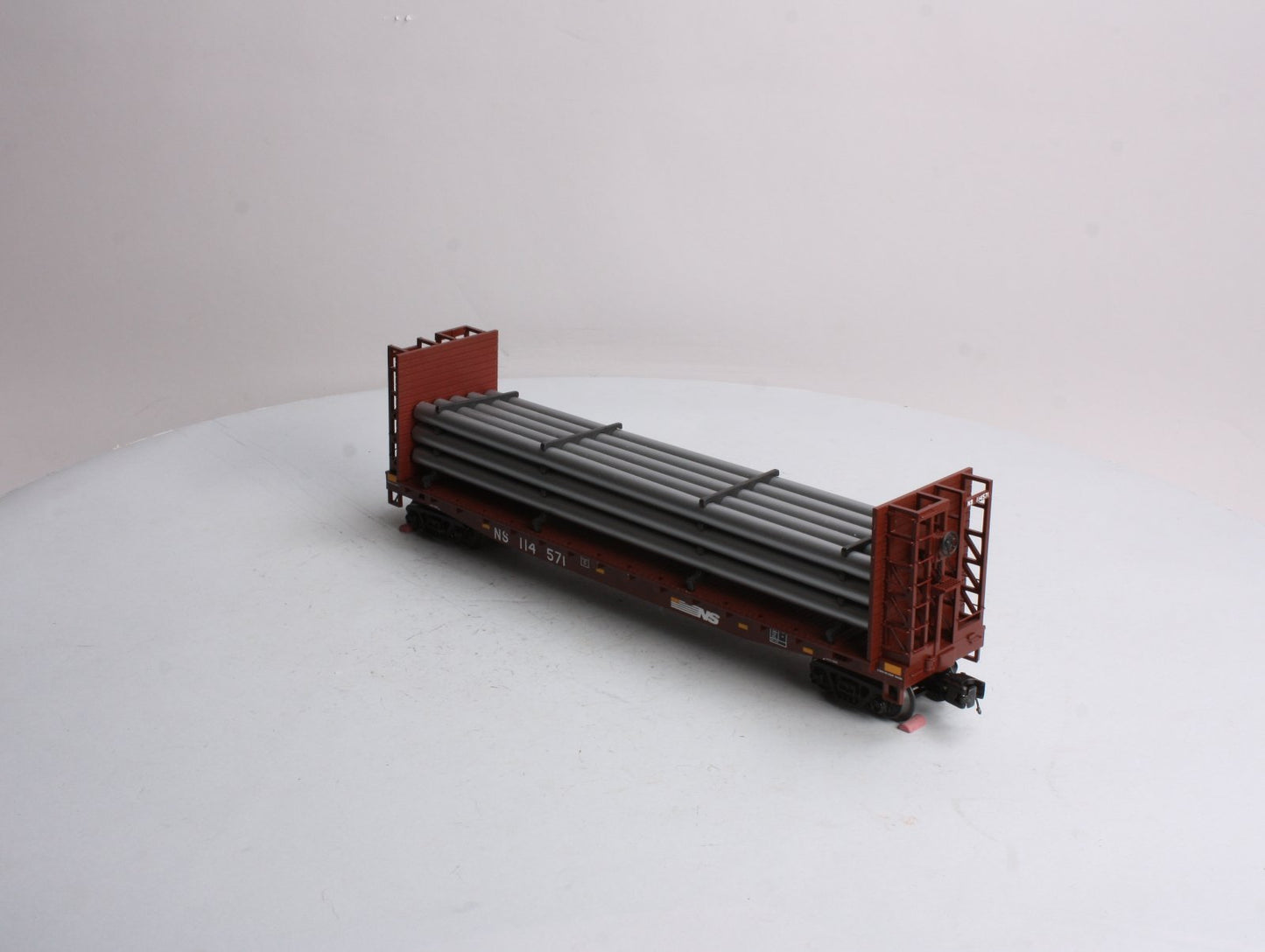 MTH 20-98666 Norfolk Southern Flat Car - w/Bulkheads & Pipe Load