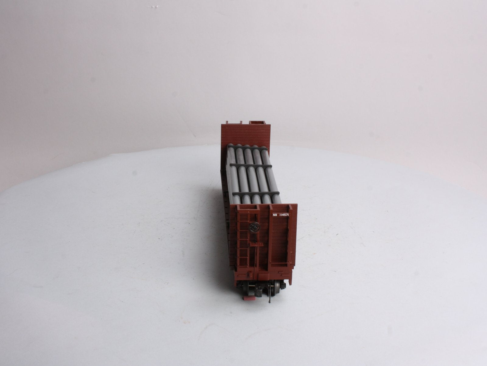 MTH 20-98666 Norfolk Southern Flat Car - w/Bulkheads & Pipe Load