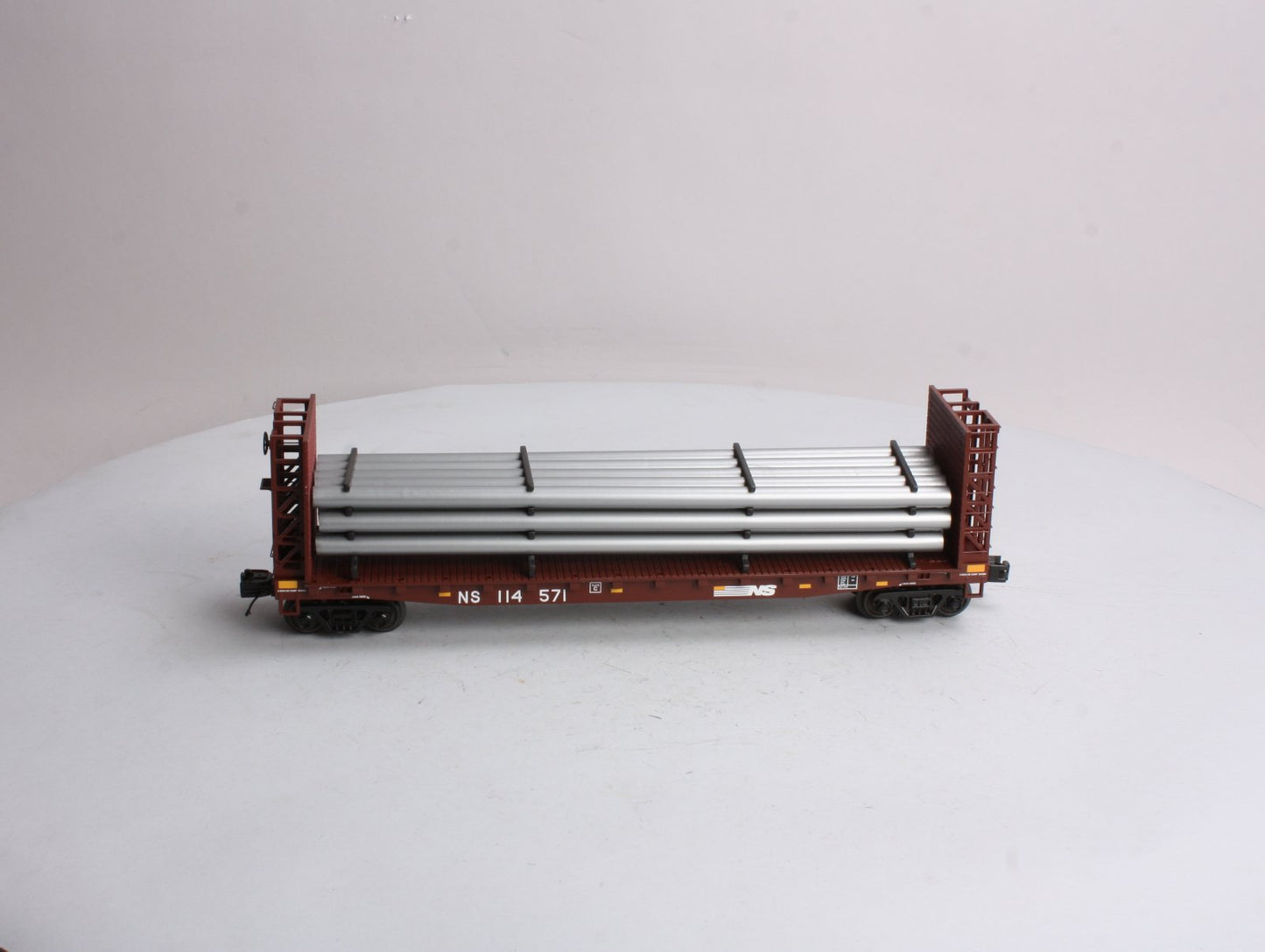 MTH 20-98666 Norfolk Southern Flat Car - w/Bulkheads & Pipe Load