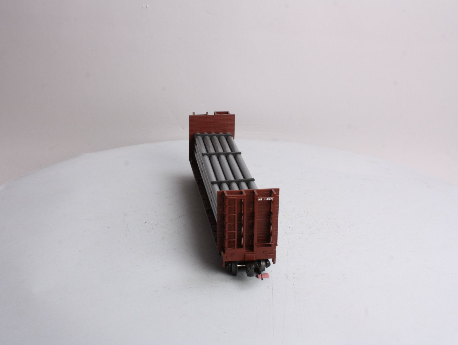 MTH 20-98666 Norfolk Southern Flat Car - w/Bulkheads & Pipe Load