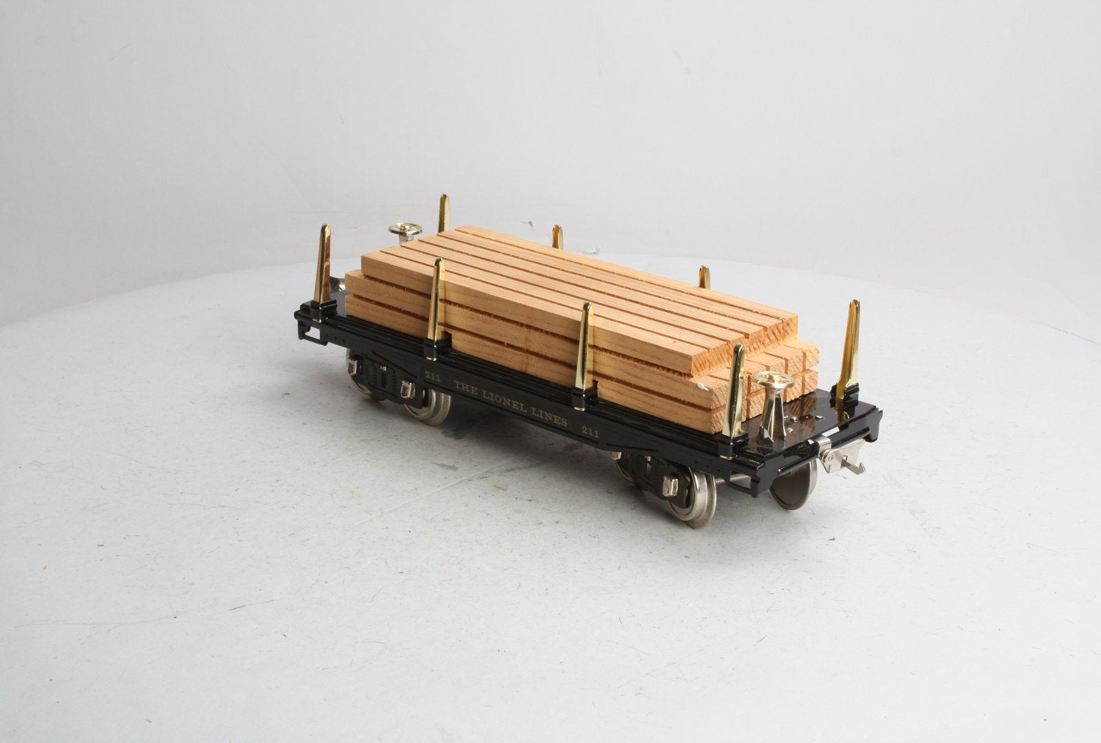 MTH 11-30033 Std. Flatcar w/Load #211 blk/Brss