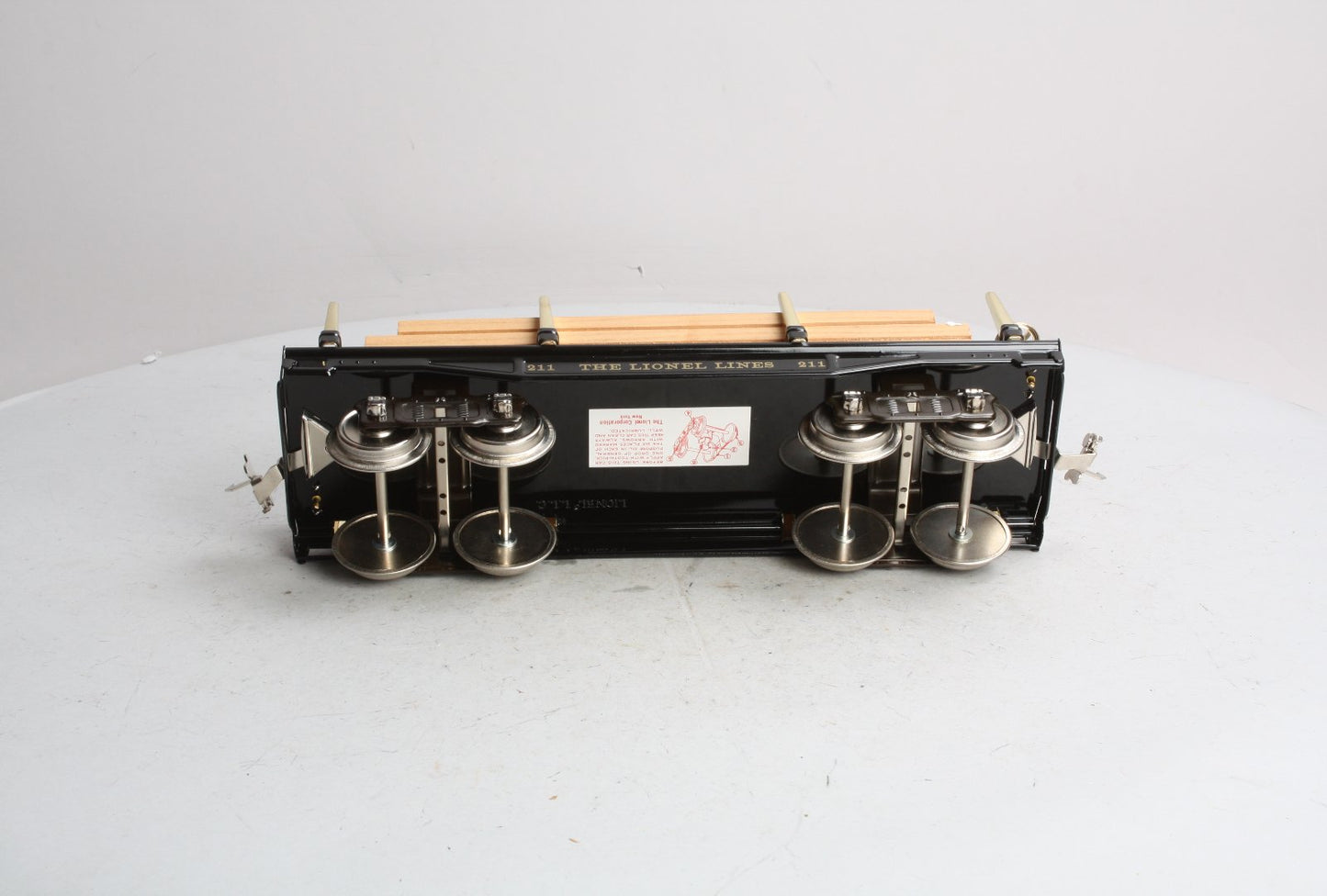 MTH 11-30033 Std. Flatcar w/Load #211 blk/Brss