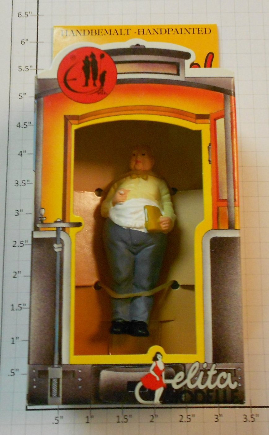 Elita Modelle 10049 Fat guy with red book figure