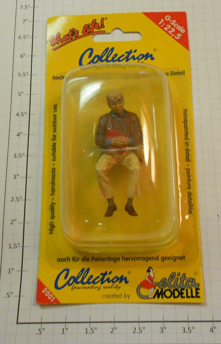 Elita Modelle 10113 Sitting old man sleeping holding a red book figure