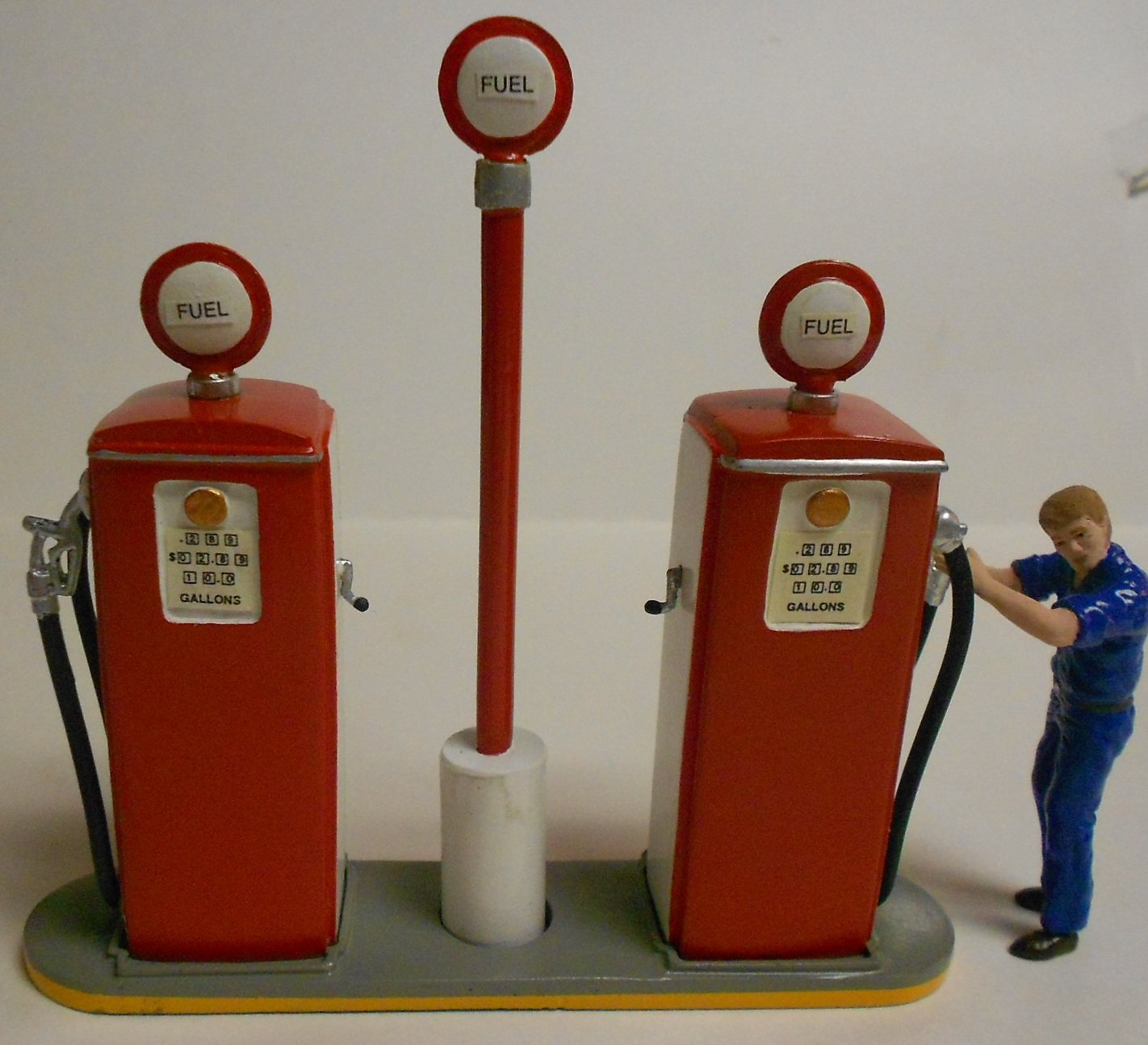Kramer 003 Two Gas Pumps With An Attendent