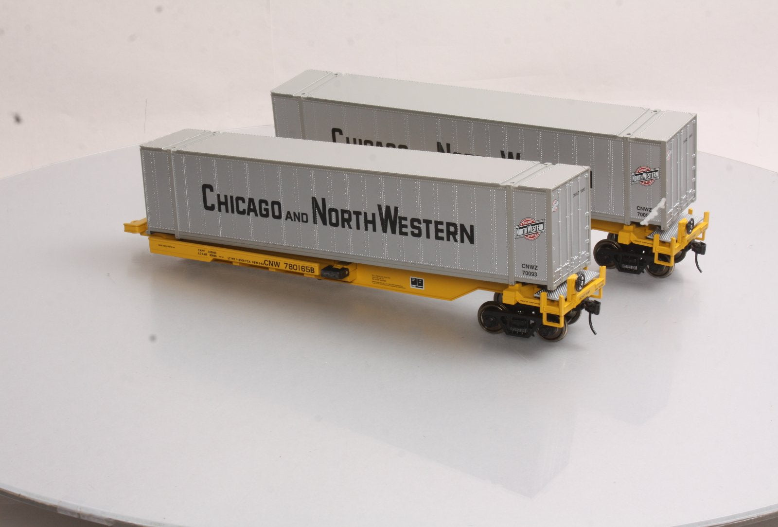 MTH 20-95085 O C&NW Spine Car Set with 2 48' Containers (Set of 2)