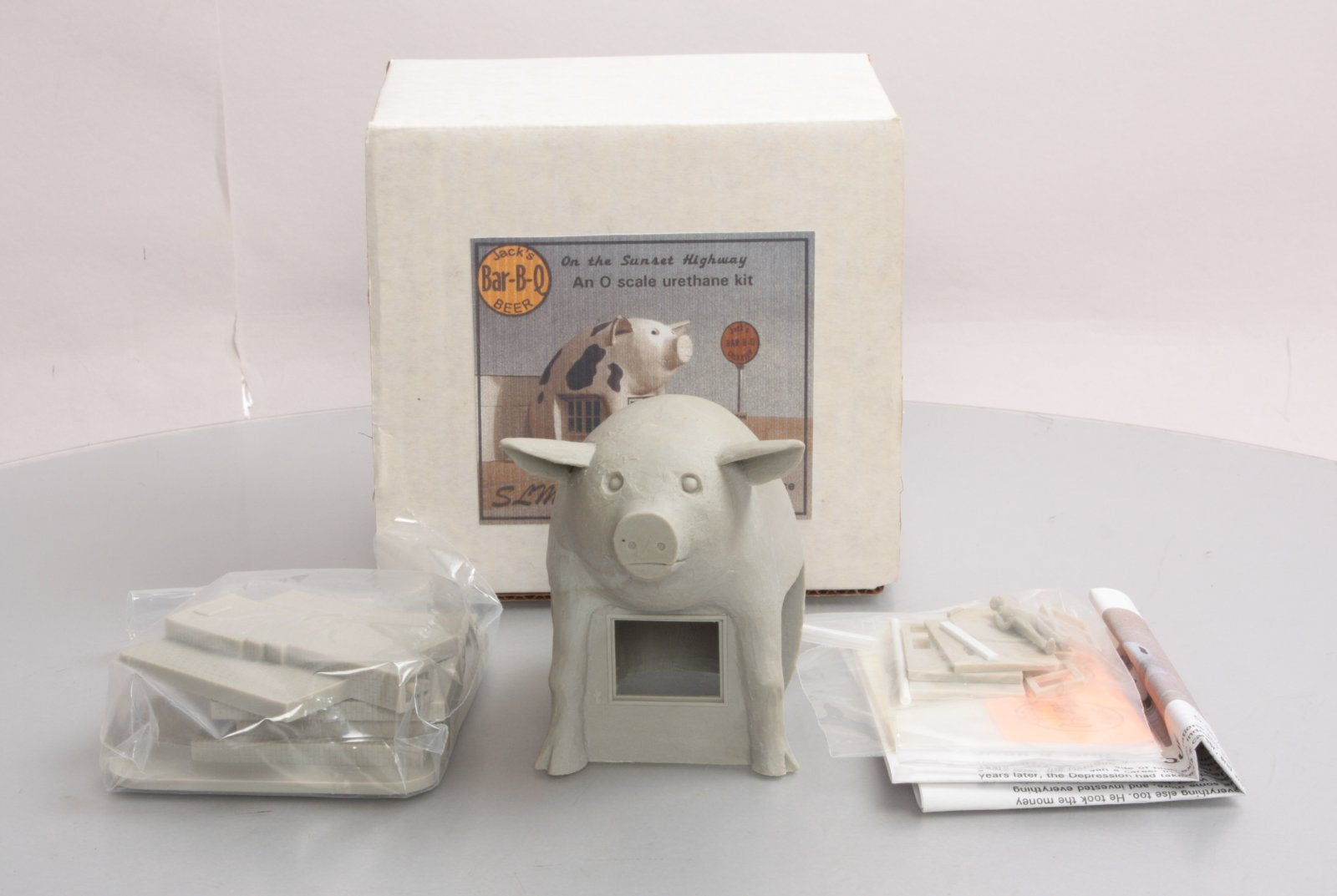 SLM 2151 O Scale Jack's Bar-B-Que Pig Urethane Kit. Does not include instruction