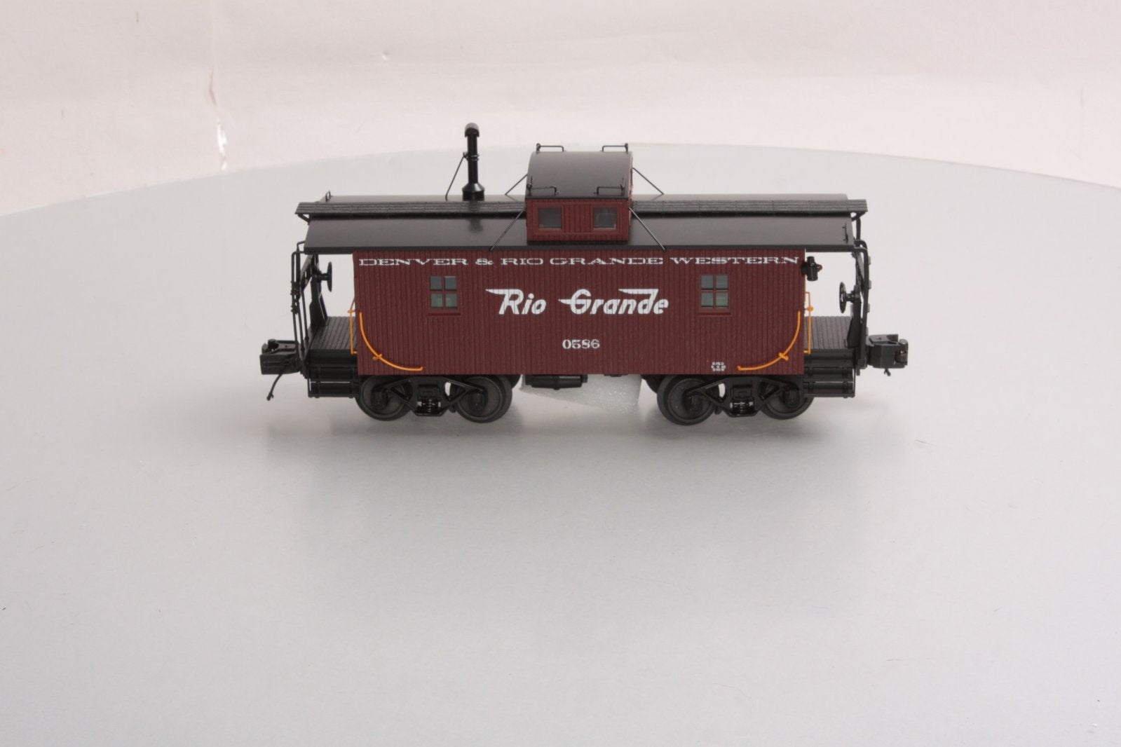 MTH 20-91358 O Gauge Denver & Rio Grande Western N-6b Caboose #586