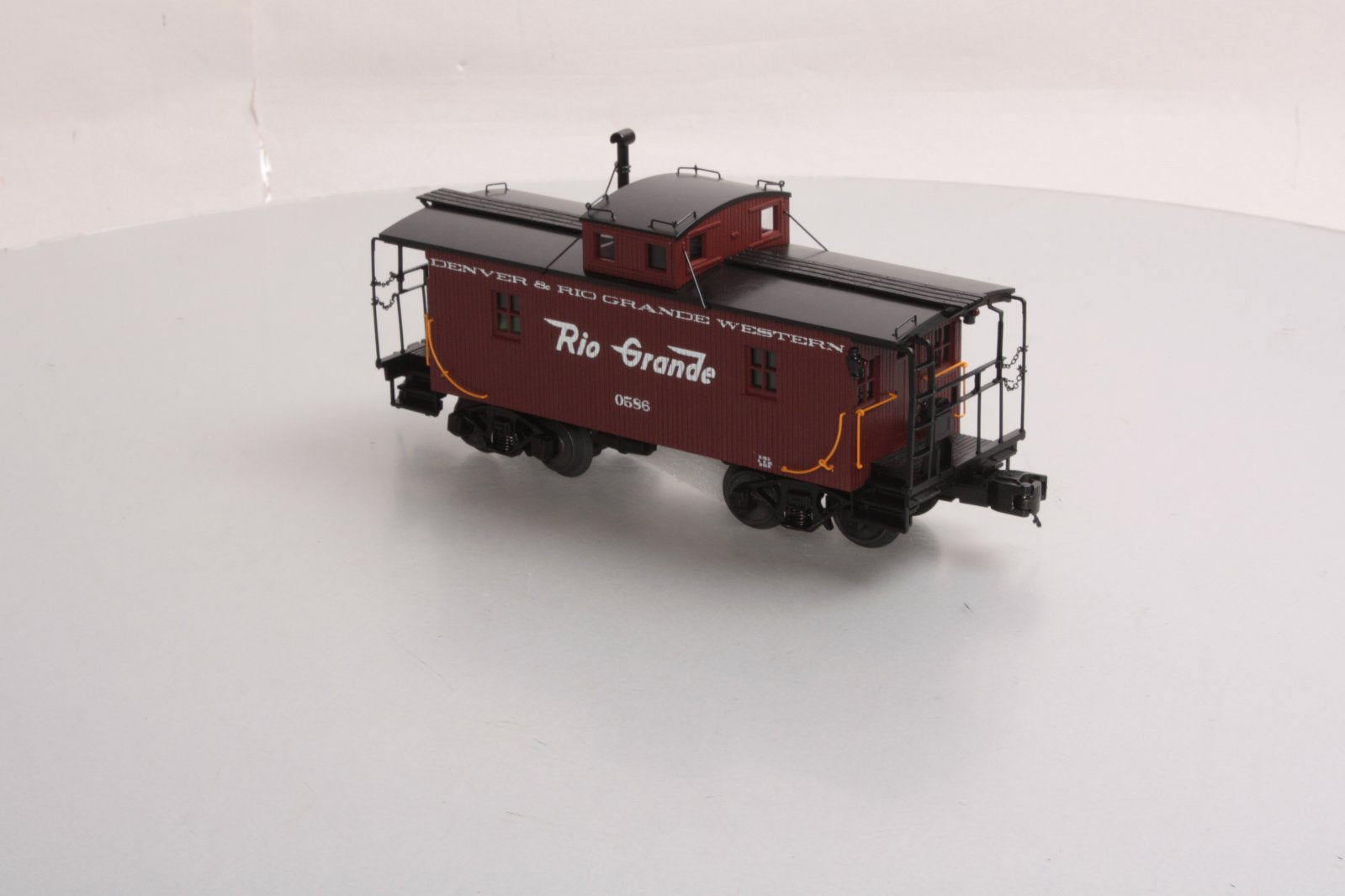 MTH 20-91358 O Gauge Denver & Rio Grande Western N-6b Caboose #586