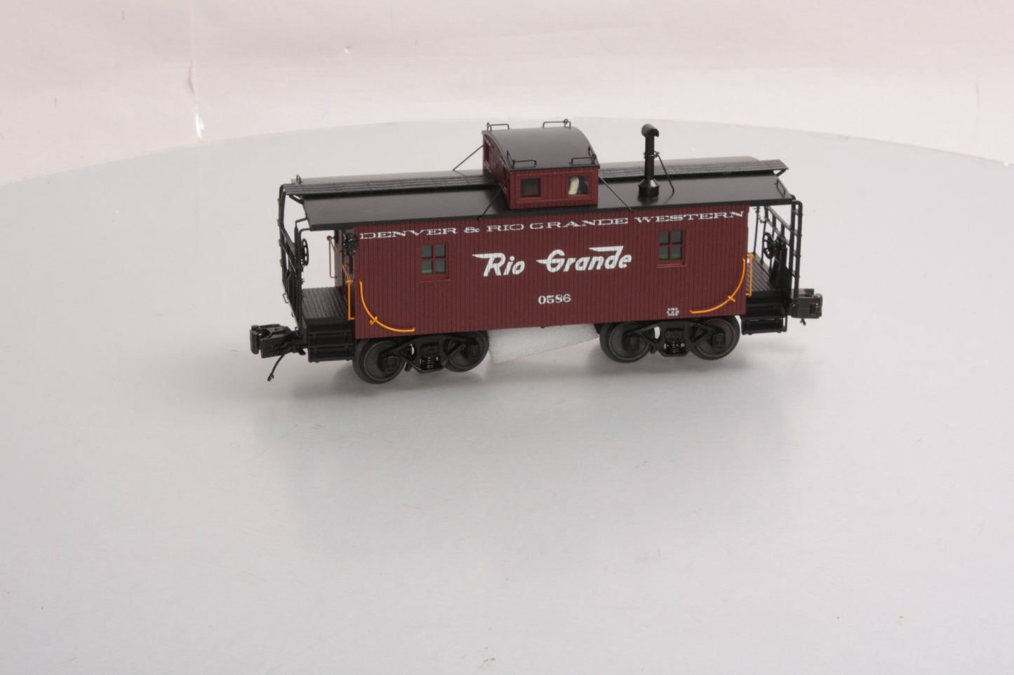 MTH 20-91358 O Gauge Denver & Rio Grande Western N-6b Caboose #586