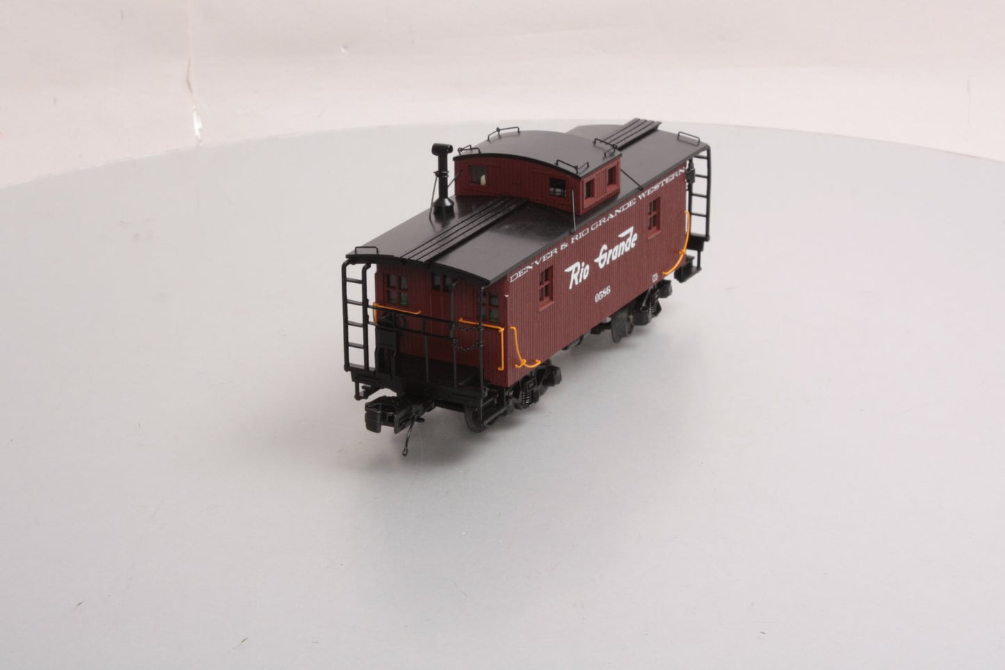 MTH 20-91358 O Gauge Denver & Rio Grande Western N-6b Caboose #586