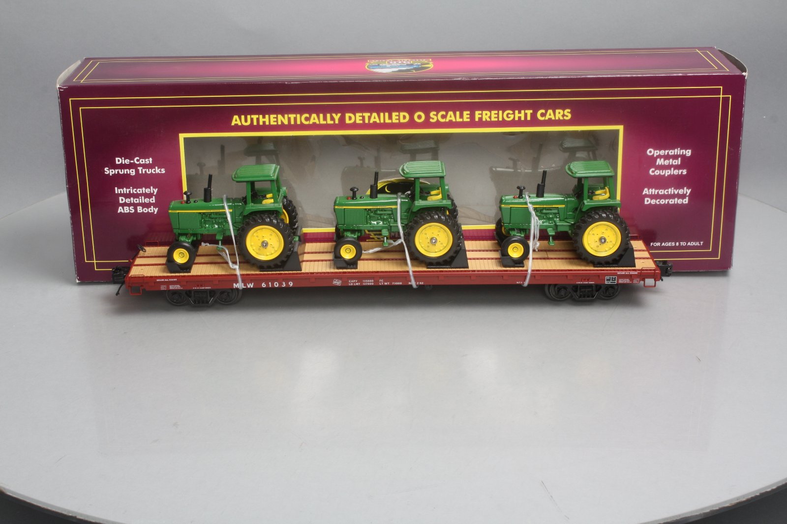 MTH 20-98643 O Milwaukee Road 60' Flat Car w/ 3 John Deere 4230 Tractors #61039