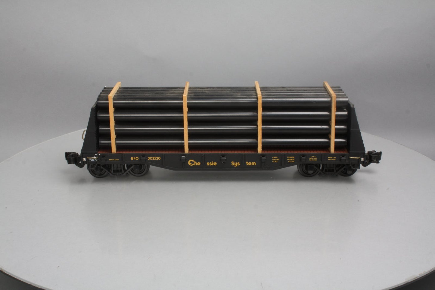 Aristo-Craft 46409 G Scale Chessie System Flat Car w/Pipe Load - Plastic Wheels