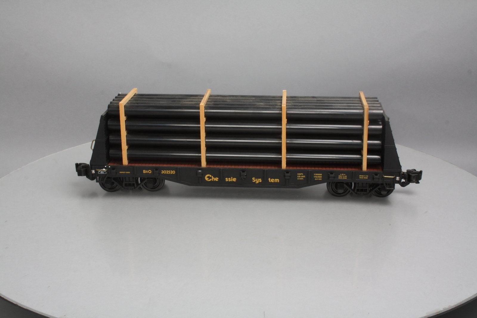 Aristo-Craft 46409 G Scale Chessie System Flat Car w/Pipe Load - Plastic Wheels