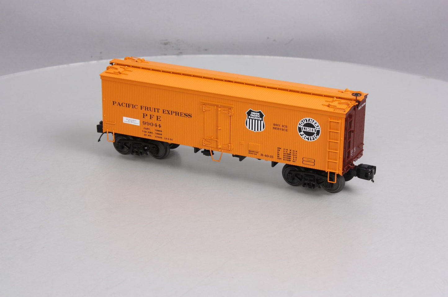 MTH 20-94337 O Pacific Fruit Express 36’ Woodsided Reefer Car #99044