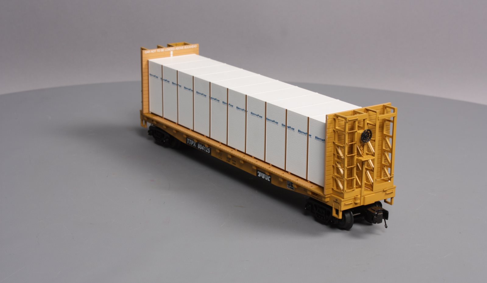 MTH 20-98662 TTX Flat Car w/Bulkheads w/Covered Wood Load V2