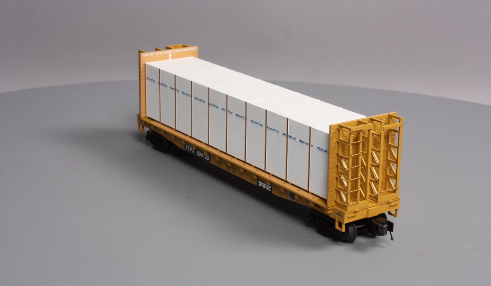MTH 20-98662 TTX Flat Car w/Bulkheads w/Covered Wood Load V2