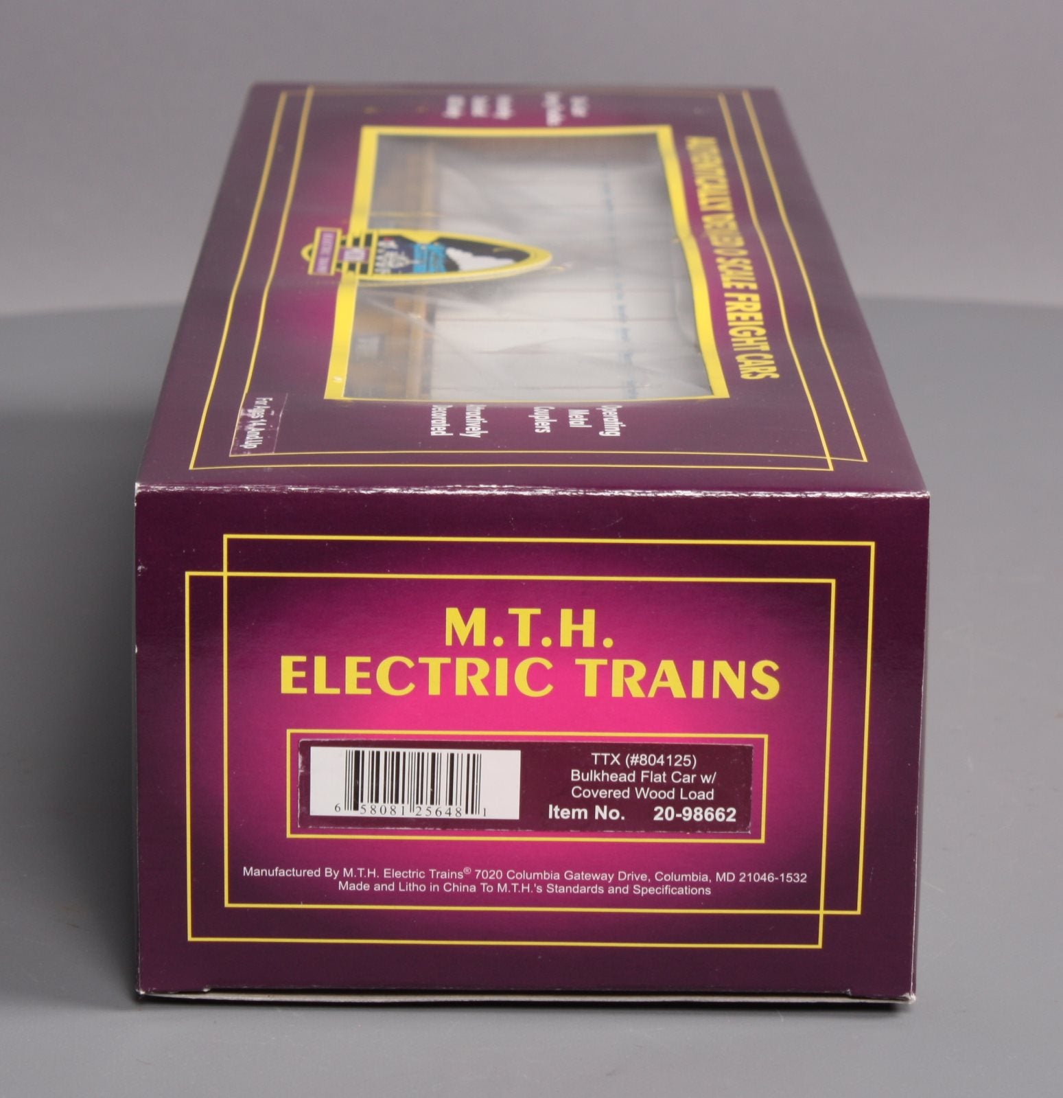 MTH 20-98662 TTX Flat Car w/Bulkheads w/Covered Wood Load V2