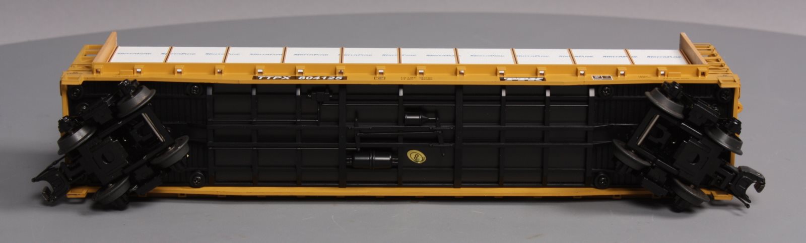 MTH 20-98662 TTX Flat Car w/Bulkheads w/Covered Wood Load V2