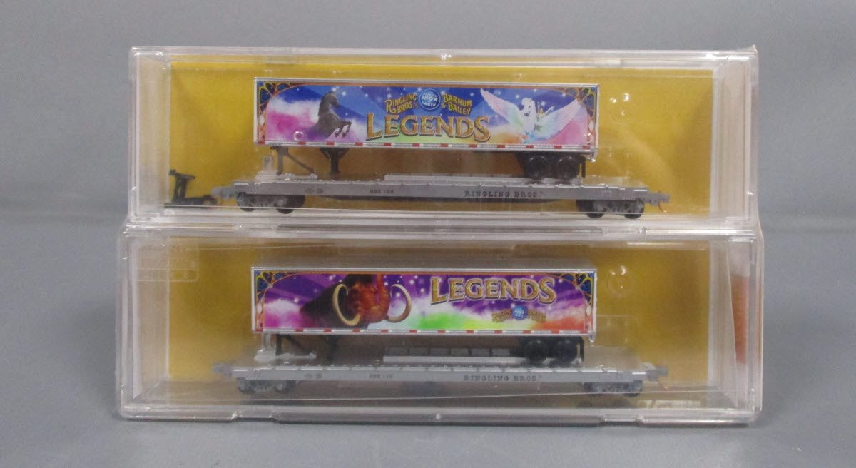 Micro-Trains 06400140 N RBBX 50' Fishbelly Flatcars with Trailer Load 2-Pack
