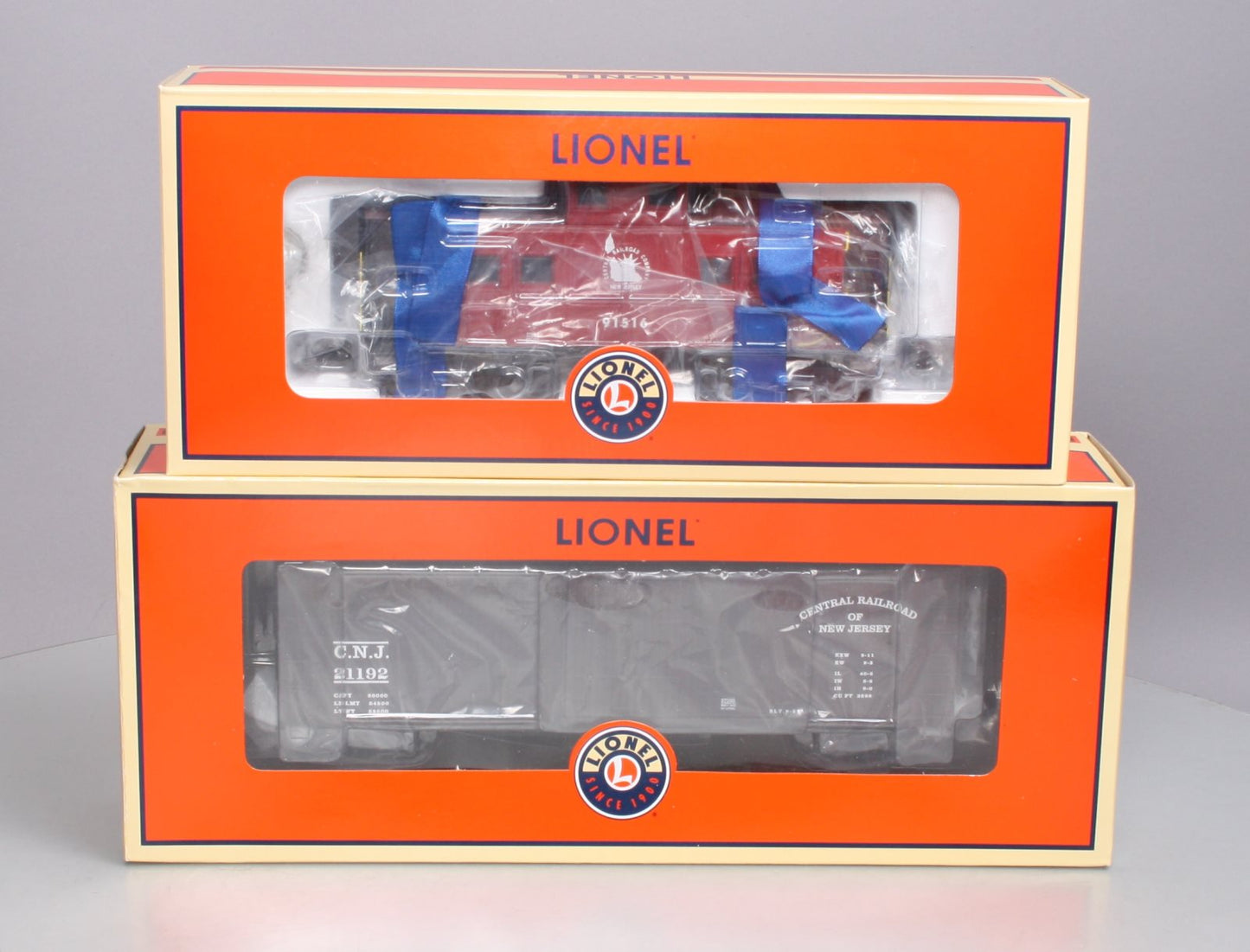 Lionel 6-27289 O Gauge Jersey Central Caboose and Double Sheath Boxcar 2-Pack