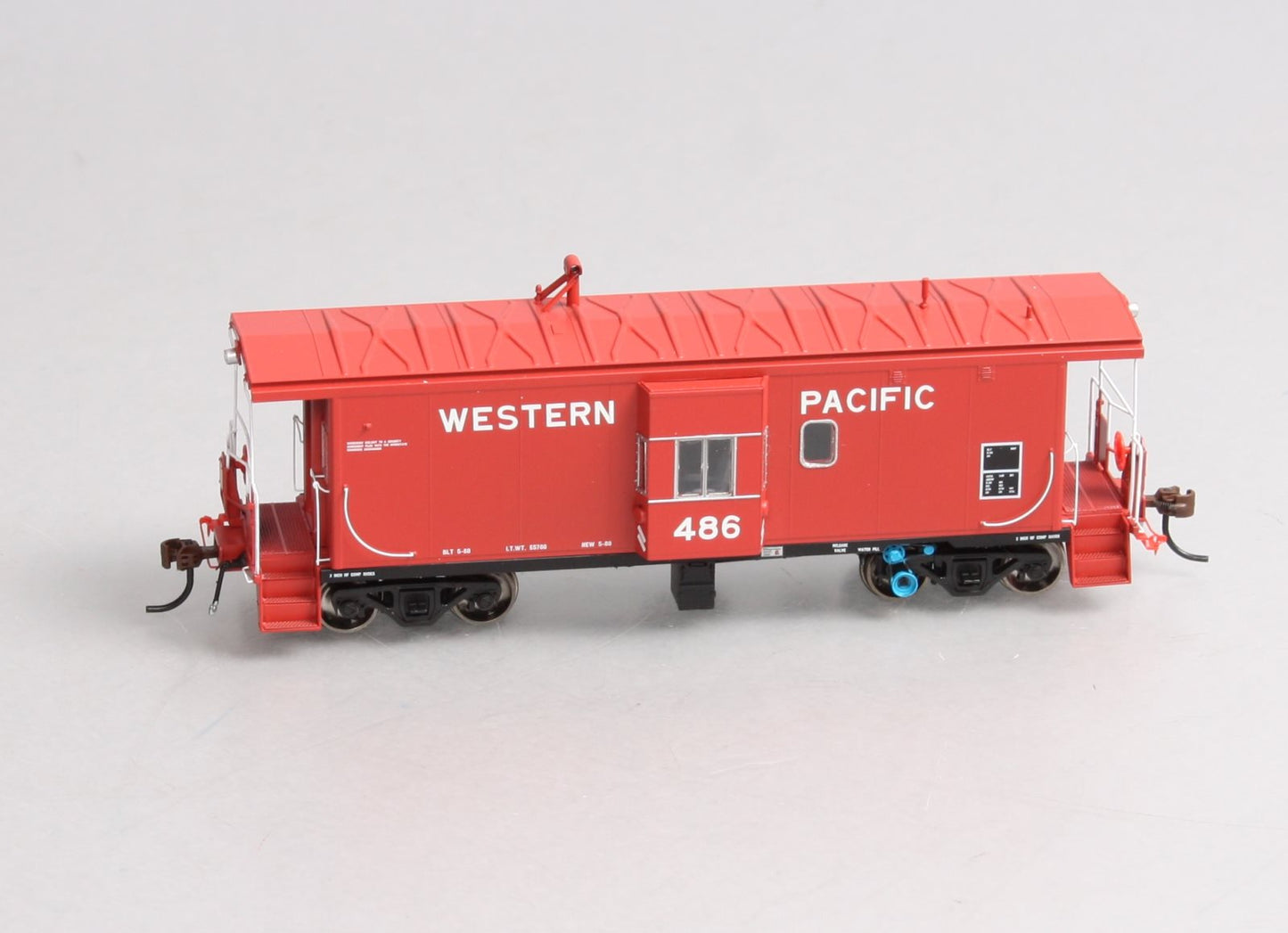 Athearn G63035 HO Genesis Western Pacific Bay Window Caboose W/Lights #486