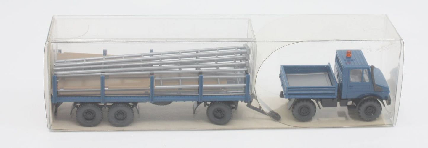 Wiking 27392 HO Unimog U1700 with Stakes and Blue Trailer