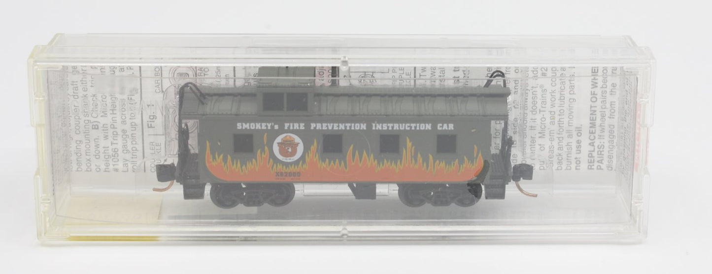 MicroTrains X62000 '36 Riveted Steel Caboose Offest Supola Smokey Bear