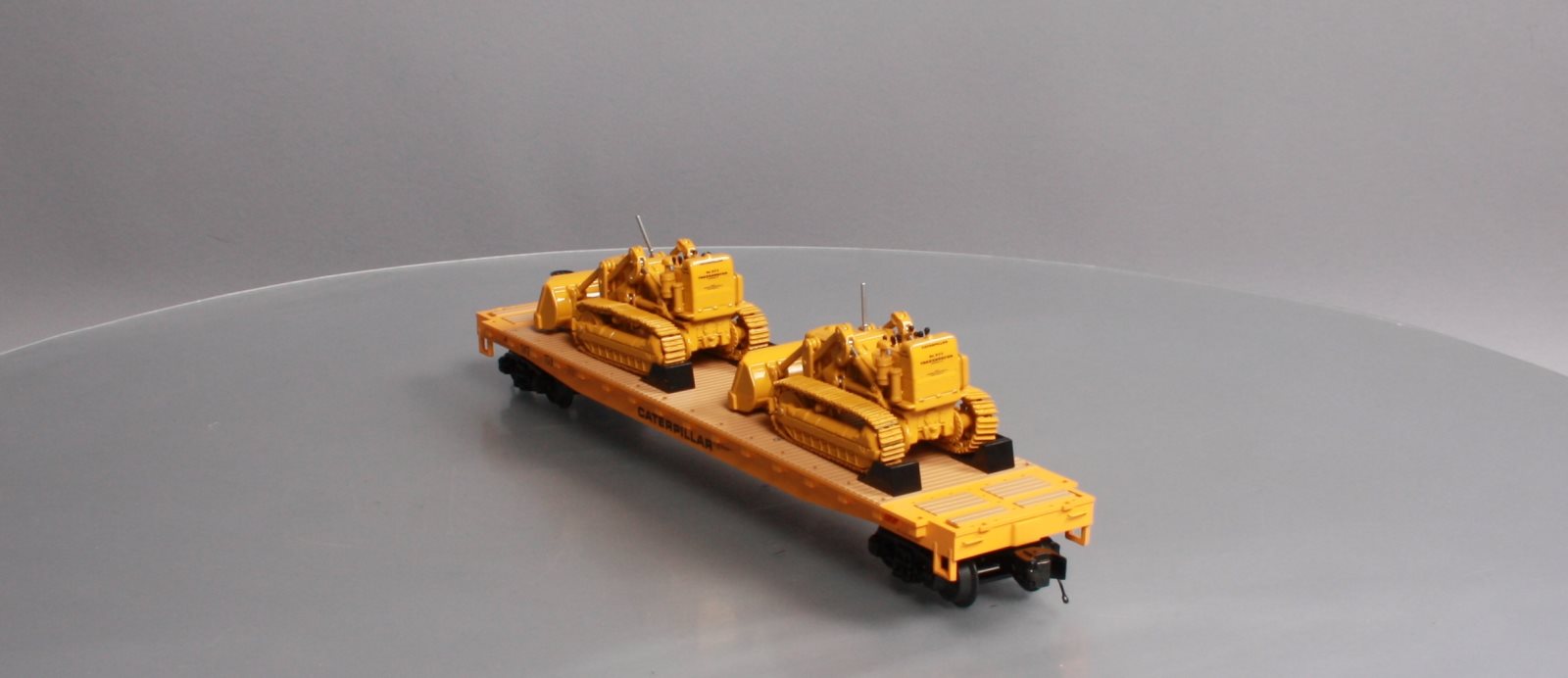 MTH 20-98648 Caterpillar 60’ Flat Car with 2 CAT No. 977 Traxcavators #977516