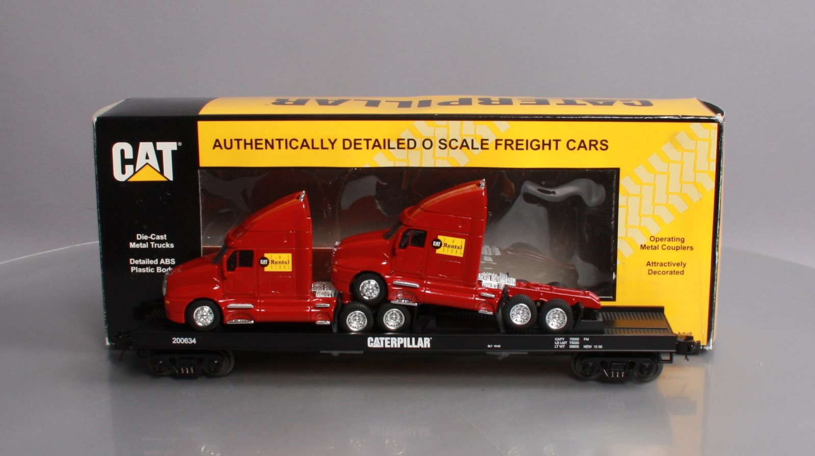 MTH 20-98531 O Gauge Caterpillar Flat Car w/ 2 CAT Rental Store Haulers #200634