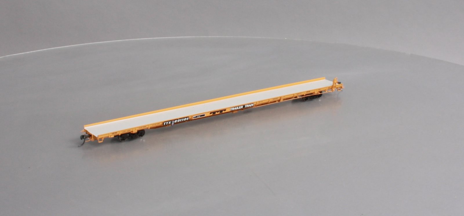 Atlas 20004094 HO TTX 1970s F89J Flat Car (Mid/End Hitches) #601104