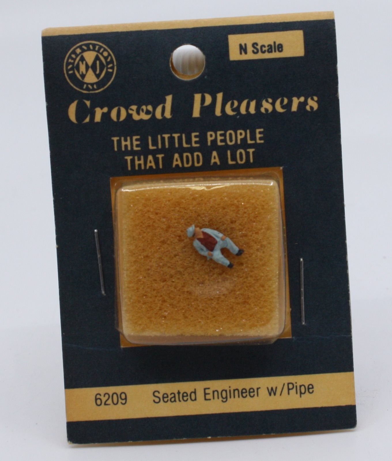 NJ International 6209 N Scale Corwd Pleasers Seated Engineer w/ Pipe Figure