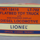 Lionel TMT-18416 LT-702 Lionel Lines Flatbed Toy Truck with Diesel Locomotive
