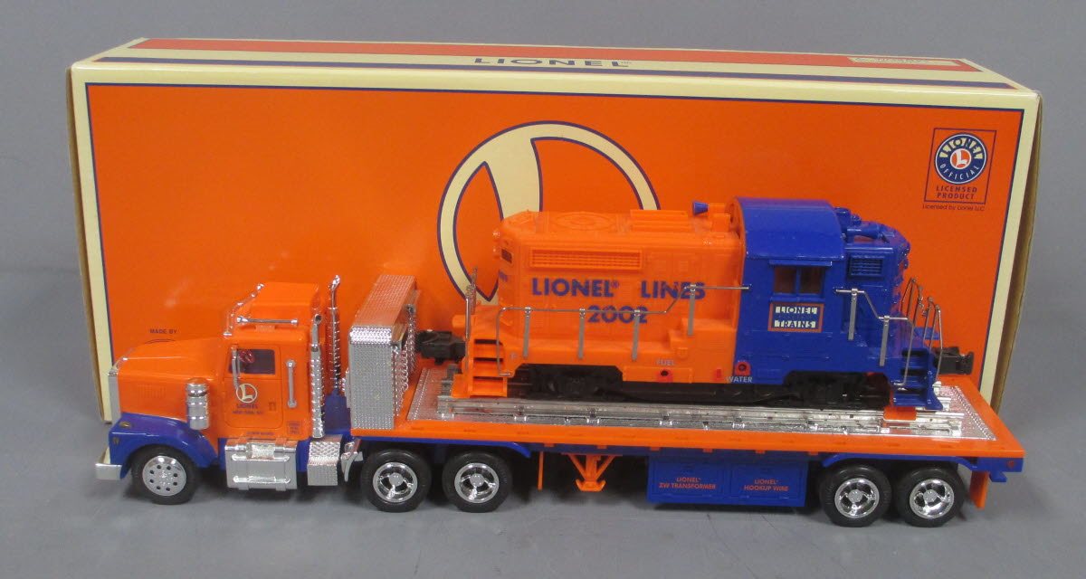 Lionel TMT-18416 LT-702 Lionel Lines Flatbed Toy Truck with Diesel Locomotive