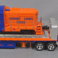 Lionel TMT-18416 LT-702 Lionel Lines Flatbed Toy Truck with Diesel Locomotive