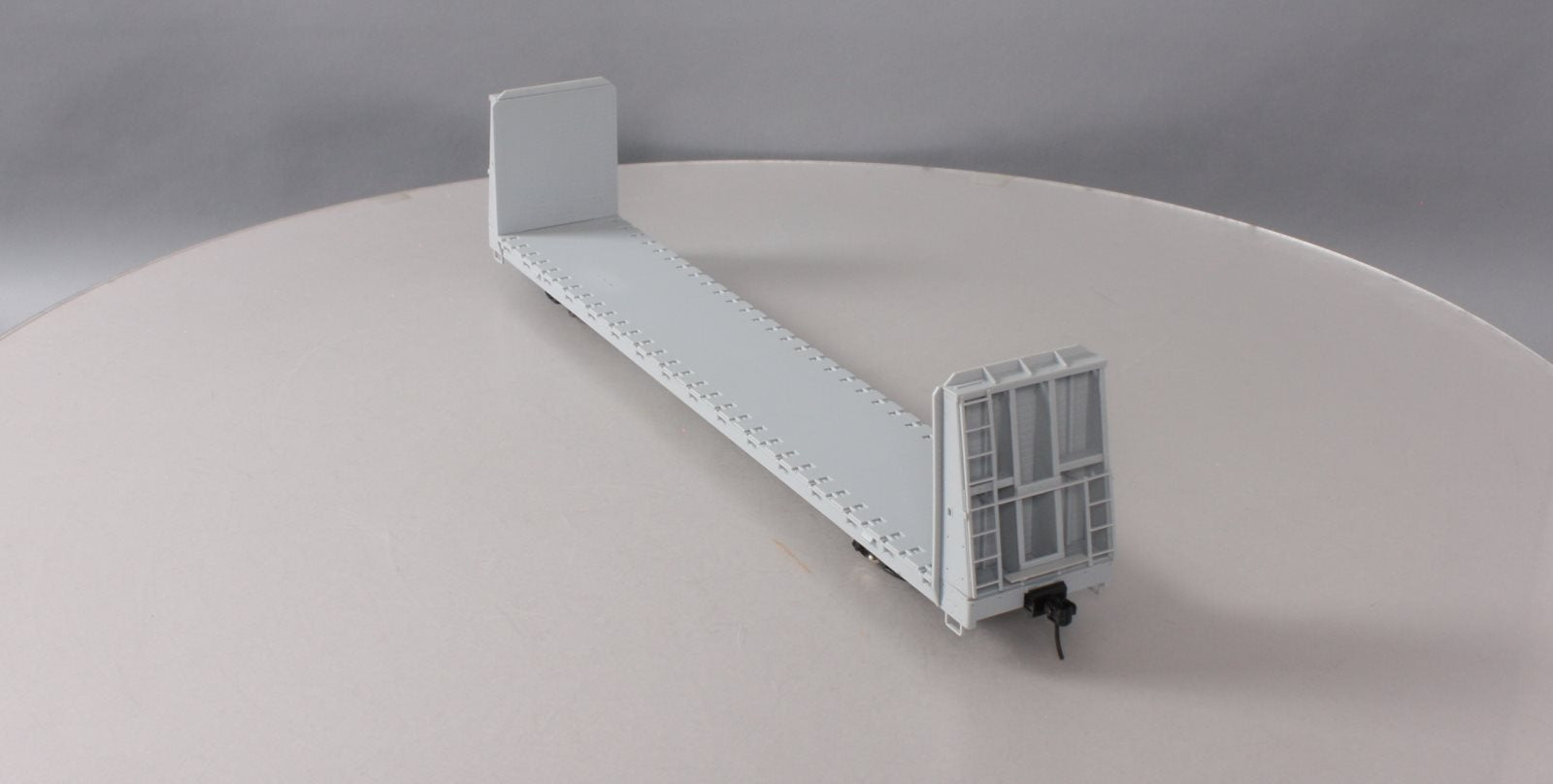 Atlas 2001750 Undecorated 62' Bulkhead Flat Car (2Rail)
