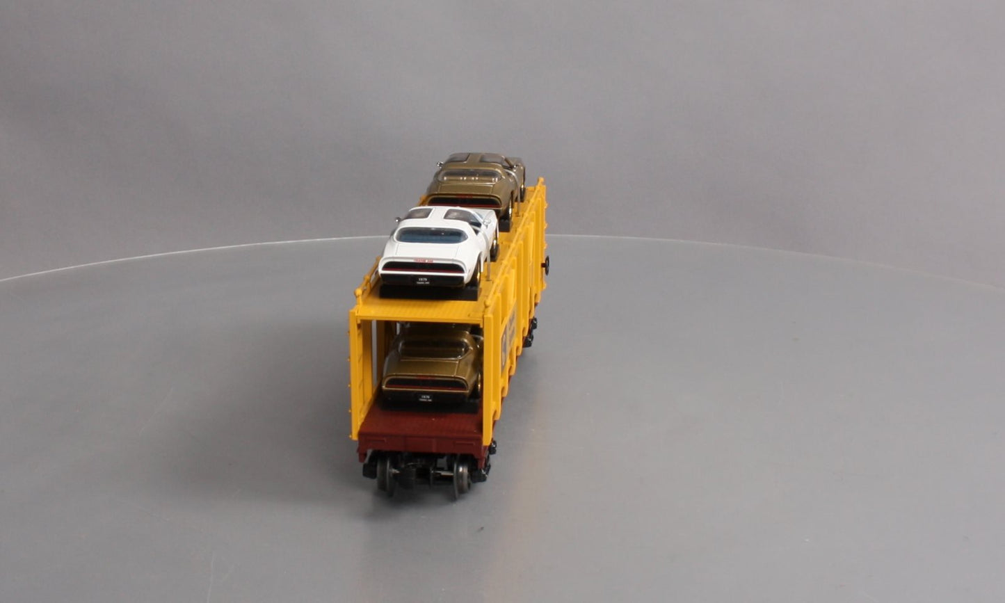 MTH 30-76642 O Chessie Auto Carrier Flat Car with 4 '79 Pontiac Firebird