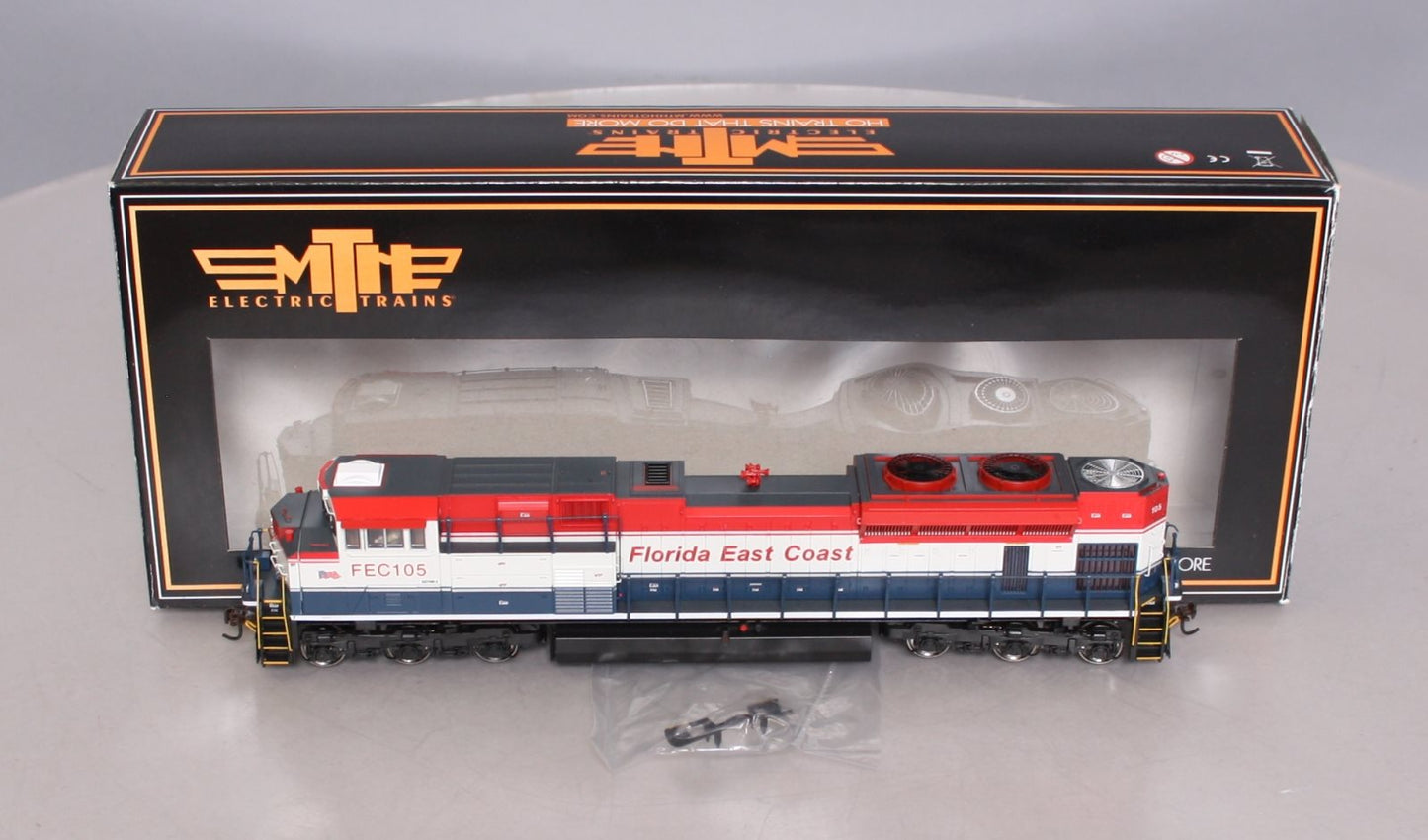 MTH 80-2030-0 HO Scale  FEC  SD70M-2 Diesel Engine #105 with NMRA Socket