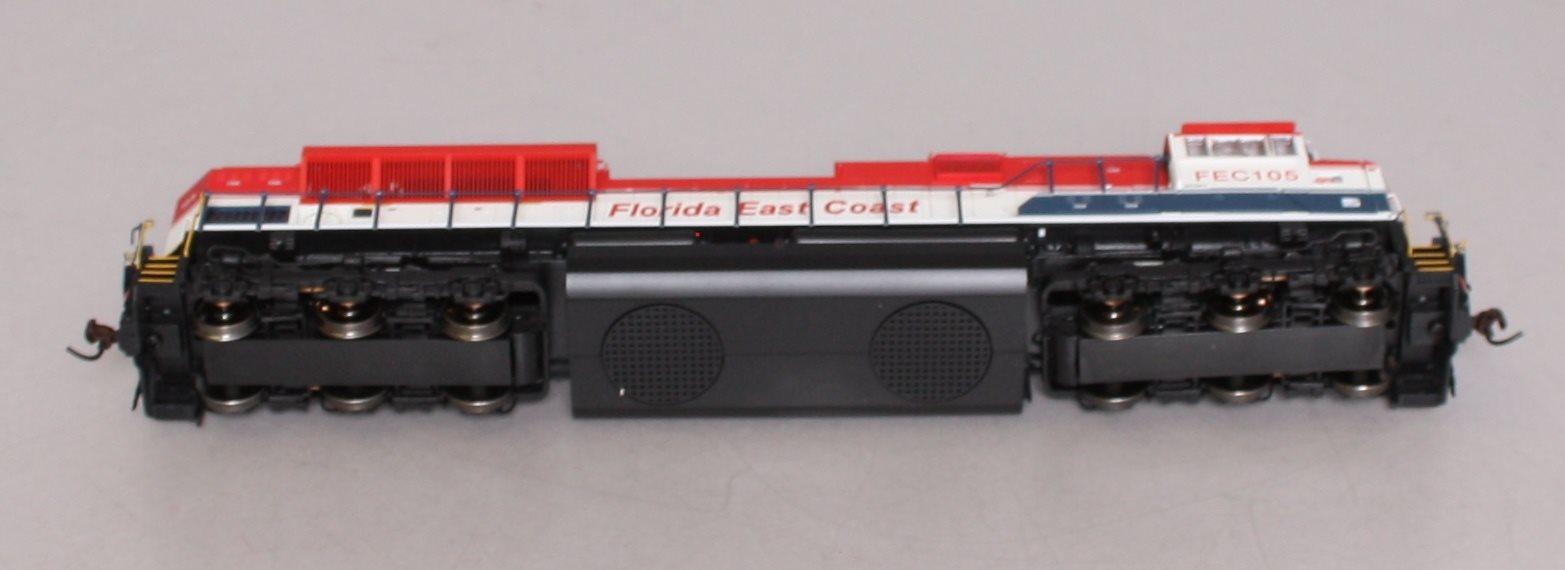 O Scale Florida East Coast/Rail America EMD SD70M-2 W/ Yellow Sill Locomotive De