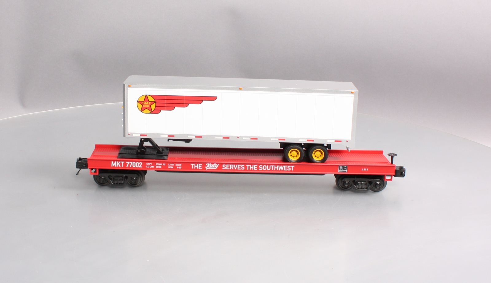 MTH 20-95216 O Missouri Kansas & Texas Railway Premier Flat Car w/ 40’ Trailer
