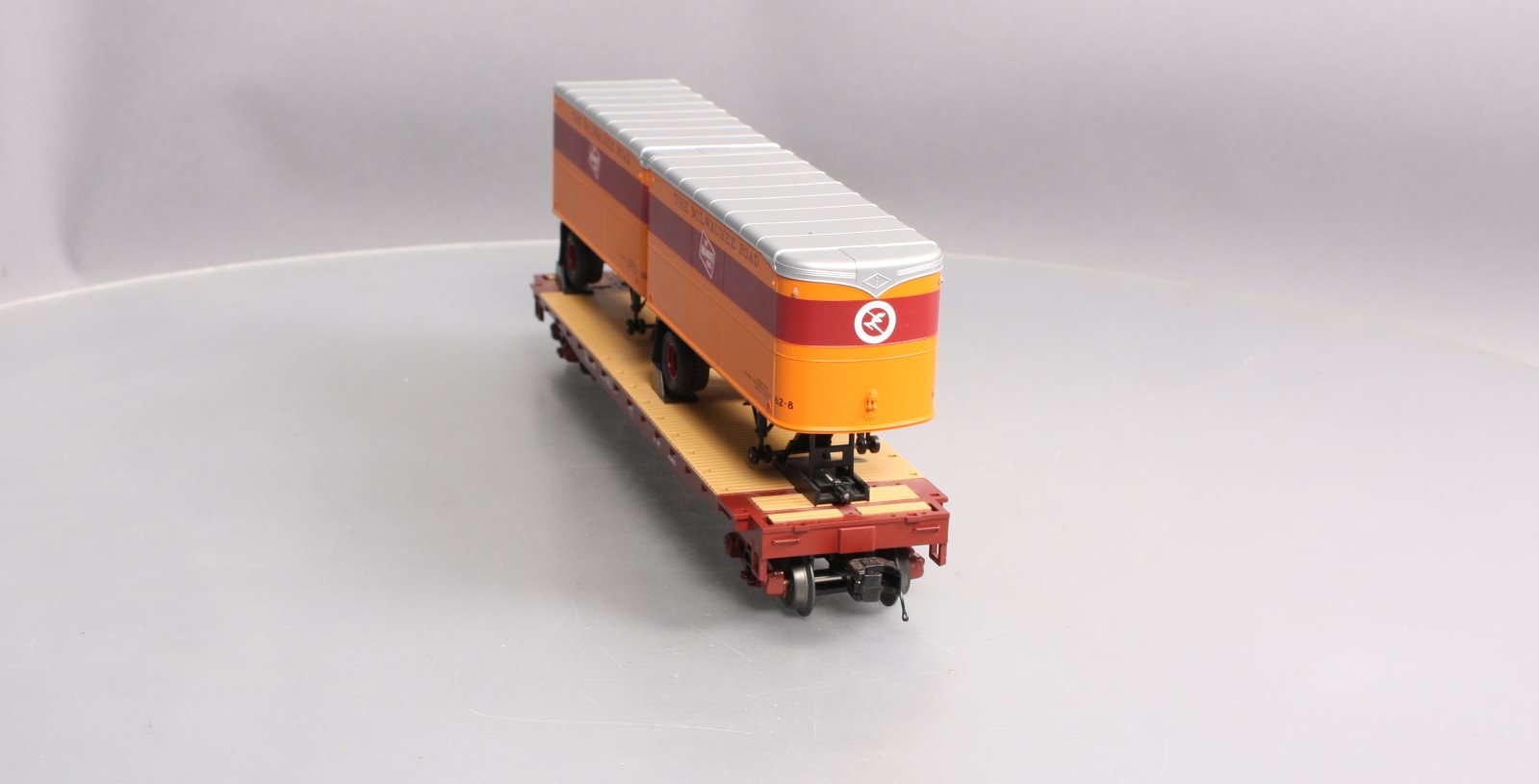 MTH 20-98697 Milwaukee Road Flat Car with 2 PUP Trailers #57010
