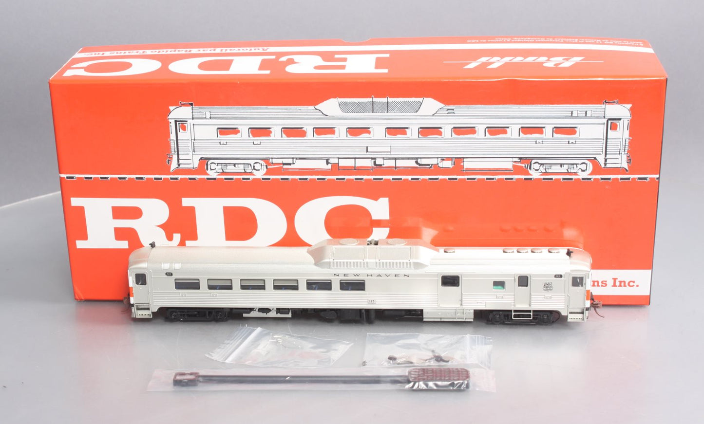 Rapido 16638 HO New Haven Budd RDC-3 Phase Ib Diesel Locomotive #125