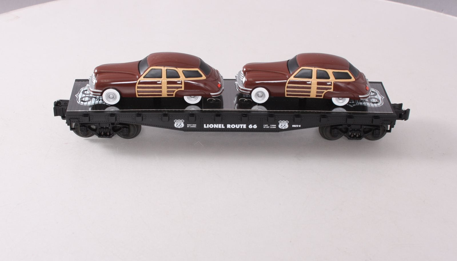 Lionel 6-17558 O Gauge Route 66 Flatcar with Two Brown Sedans