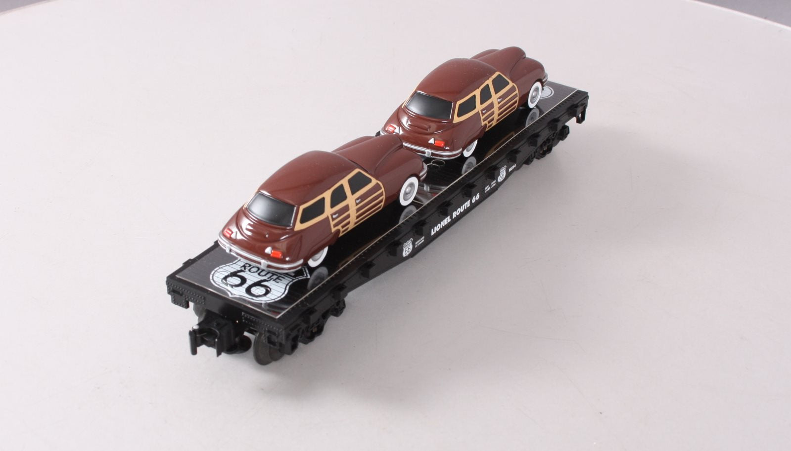 Lionel 6-17558 O Gauge Route 66 Flatcar with Two Brown Sedans