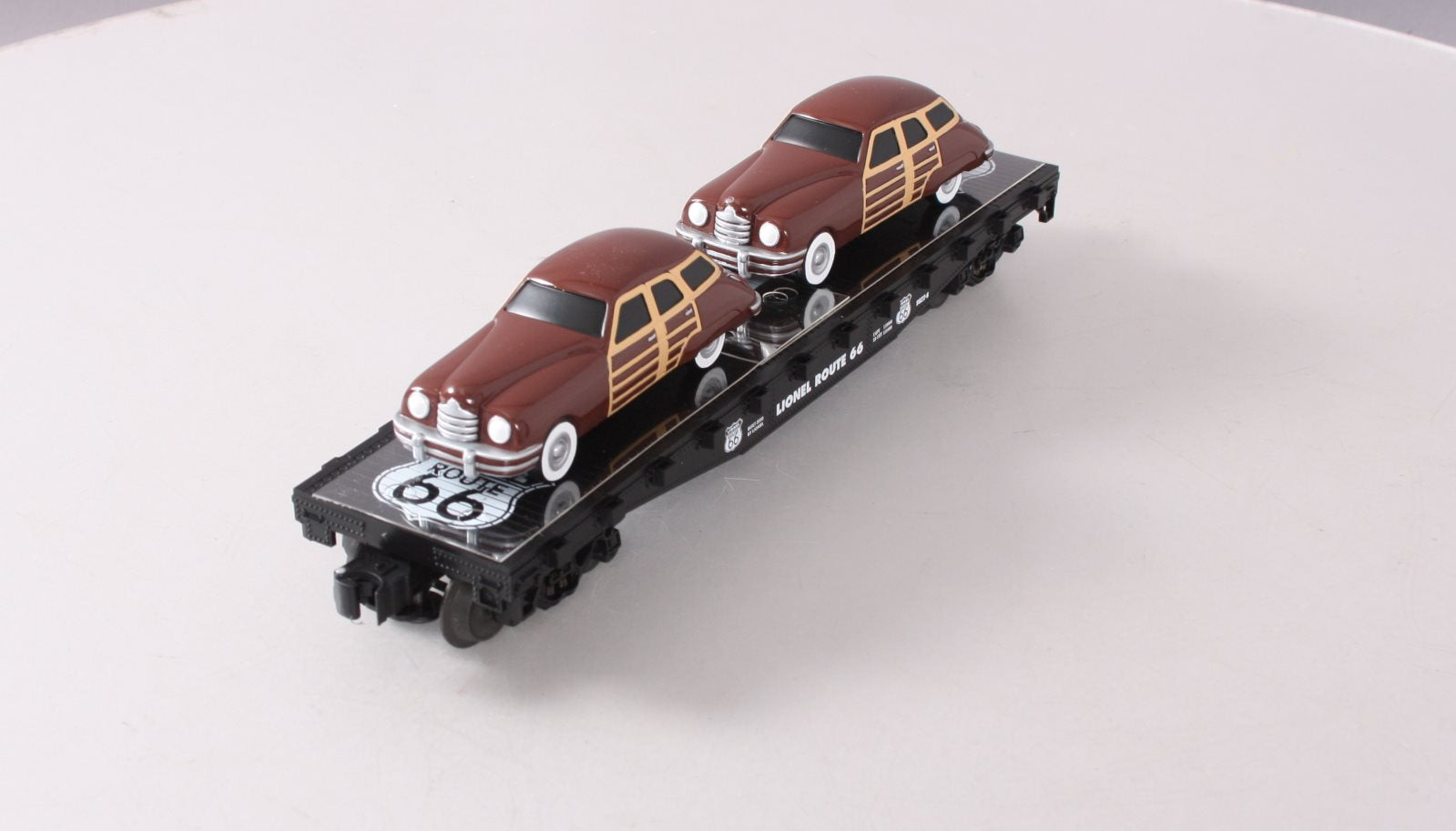 Lionel 6-17558 O Gauge Route 66 Flatcar with Two Brown Sedans