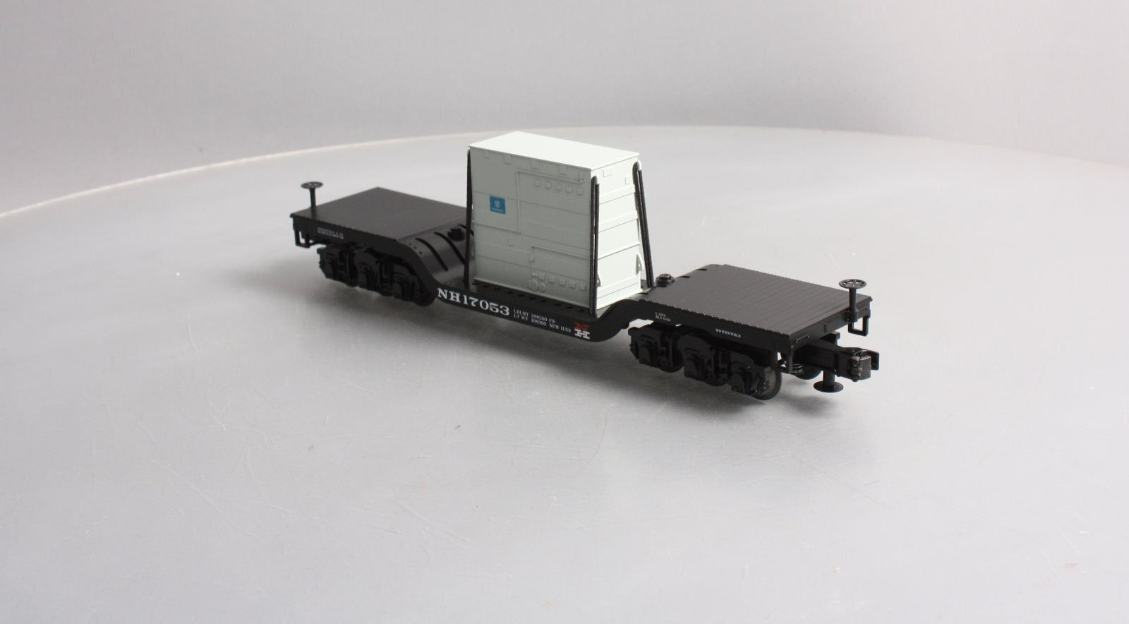 MTH 30-76511 O Gauge New Haven Depressed Center Flatcar w/Transformer Load