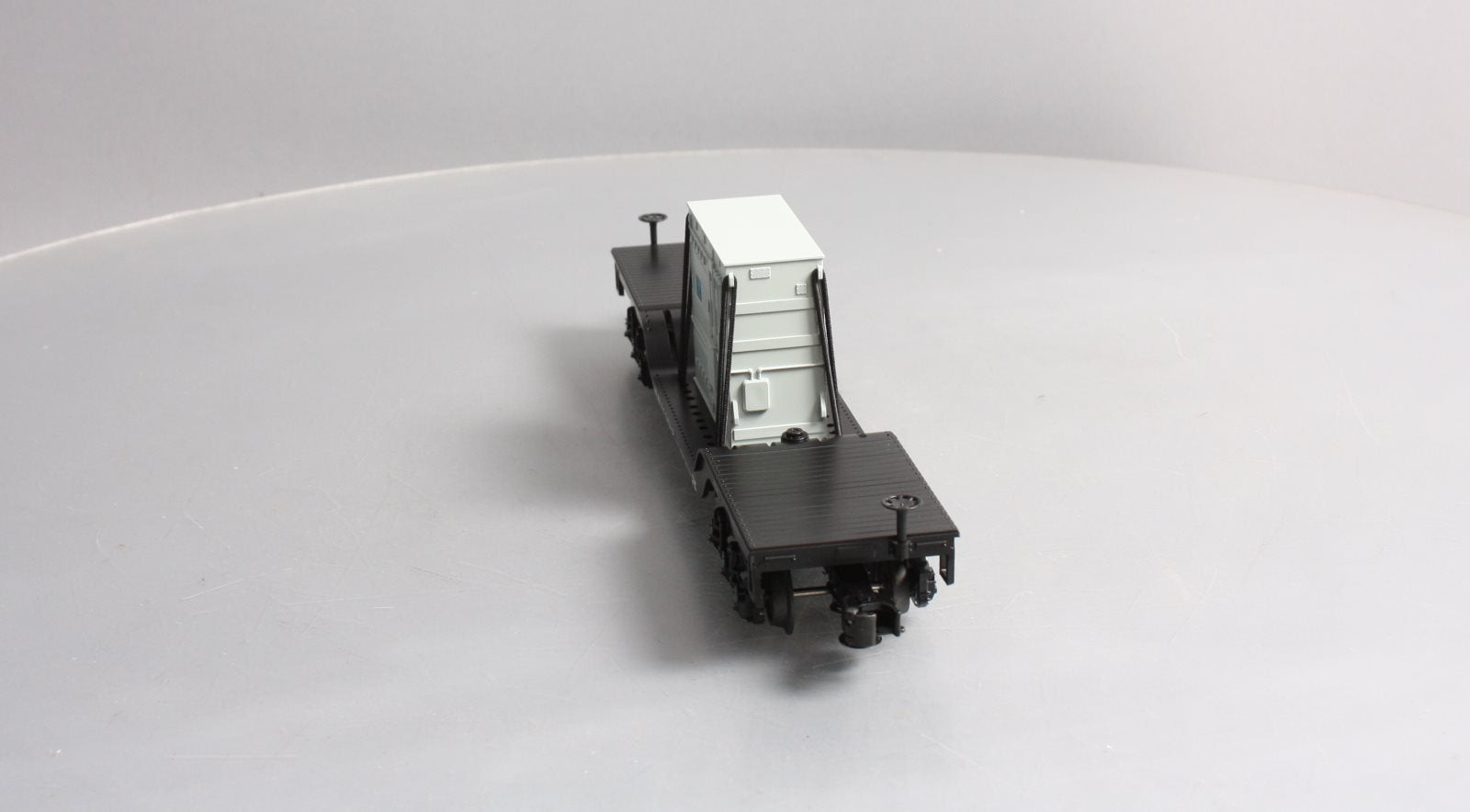 MTH 30-76511 O Gauge New Haven Depressed Center Flatcar w/Transformer Load